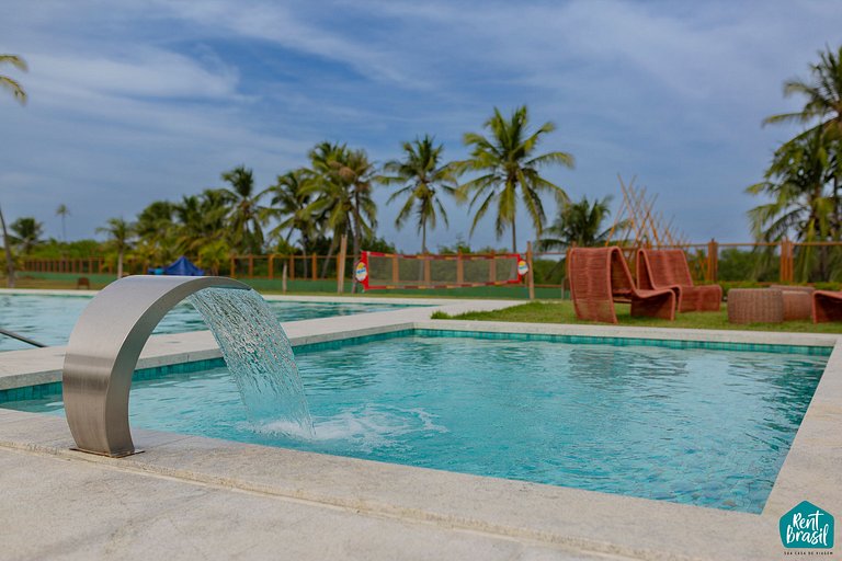 Pueblo moderno con piscina, 3 habitaciones en Imbassaí