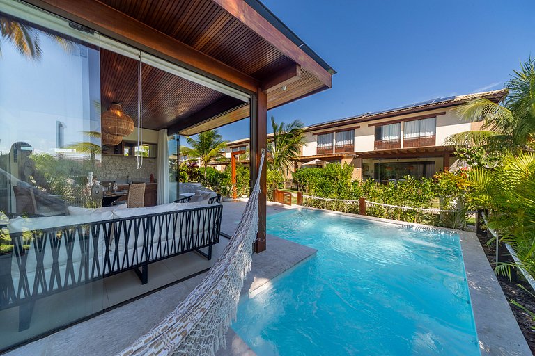 Hermoso bungaló con piscina e hidromasaje en Imbassaí - Casa